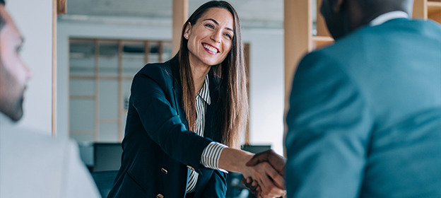 Female business woman shaking hands